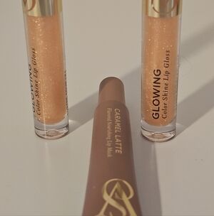 Three Victoria's Secret Glowing Lip Gloss Trio - Gold and Tan